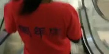 public Cum spray on Asian Escalator girl