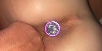 Fingering my friends extra tight pussy while she wears a butt plug