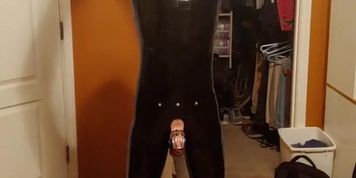 Performing exercises for Sir while plugged, in chastity and in skintight rubber head to toes (Alison Webb)