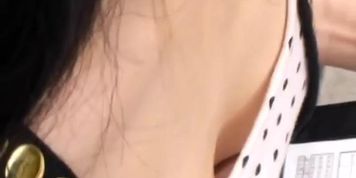 Asian downblouse video features an Asian chick with perky tits.