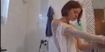 redhead masturbates in bathroom