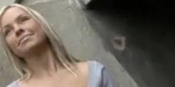 Angelic girl jerks a stranger in the street