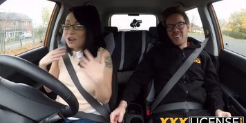 A slutty Asian chick enjoys hardcore pussy fucking in the car with her driving instructor