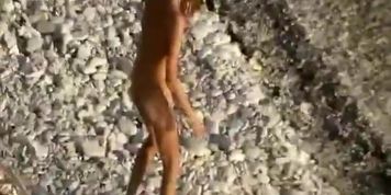 Horny couple spied on a beach