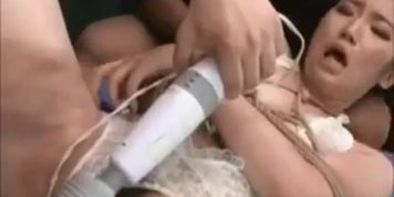 Tied Asian Sucking And Getting Toyed