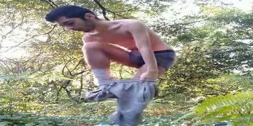 Undressing and jacking off in the woods