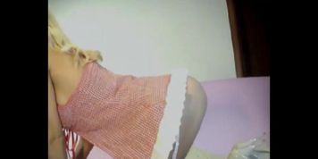 Sexy blonde in garter belt with big boobs