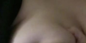 Squeezing my nipple for the camera