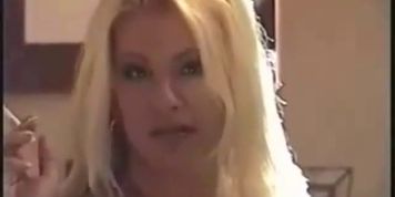 Beautiful blonde Cougar smoking sexy