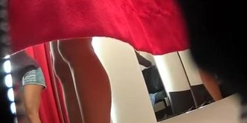 Girl spied in change cabin trying new clothes