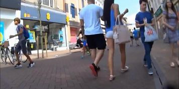 Slim Brunette In Tight White Shorts
