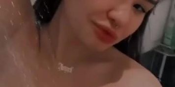 Hot girl takes a shower