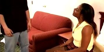 Black gf in sexy stockings lifts miniskirt and gets spanked before having sex