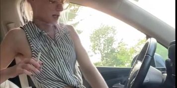 Cute Girl Doing Her Business in the Car