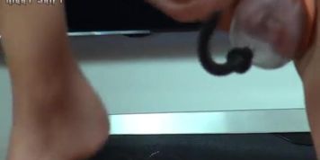 Sexy redhead masturbating with a vacuum toy and dildo