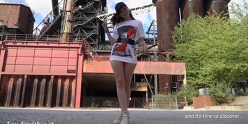 Jeny Smith is walking naked through an abandoned factory.