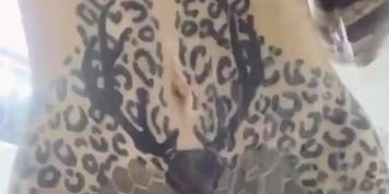 Latina is taking a shower