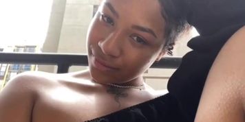 cute thick latina on the balcony showint them titties