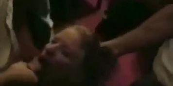 Nice girl giving a blowjob at a party