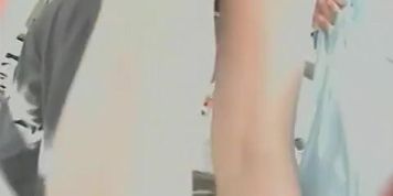 Extremely short upskirt view on the wide public street