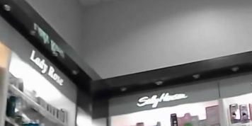 Mature girl shows us her thong in up skirt shopping mall