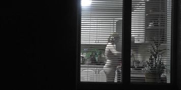 Family nudism . Naked stepdaughter cooking dinner walks naked in front of Dad at open window public