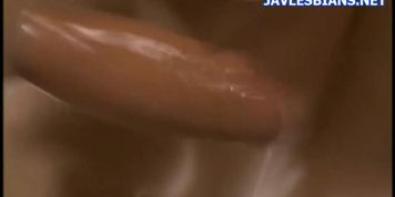 Cute young Japanese lesbian getting her tight wet pussy drilled by vibrator