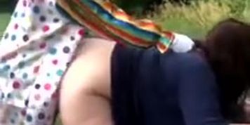 Women fucks a clown outdoor