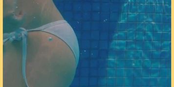 Wifey swims braless