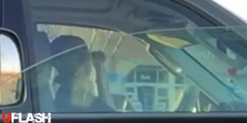 She watches car flasher
