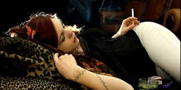 The beautiful young redhead girl Emily smoking sexy