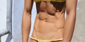 Ripped FBB playing with her abs