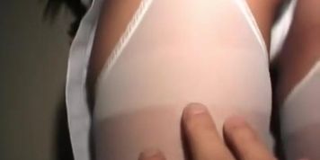 Hitomi Ikeno gets vibrator on hairy pussy through crotchless