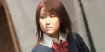 Attractive oriental schoolgirl gets interrupted on the street during sharking