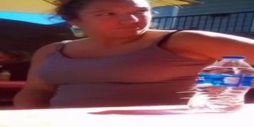 Close up of busty brunnete in tight shirt