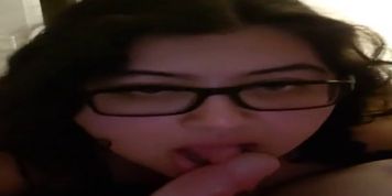 Mexican girl with glasses sucks big white dick