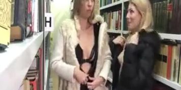 Two girls in library