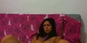 Busty brunette on webcam teasing with her big boobs and rubbing her pussy