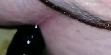 Fucking my tight young virgin boy pussy with a black dildo