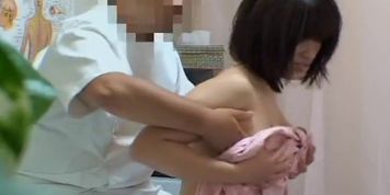Curvy Japanese enjoys in a hidden cam massage action