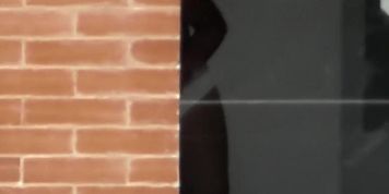 Busty woman filmed in secret while naked next to the window