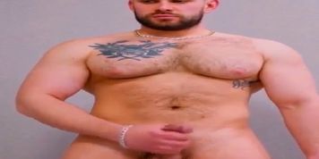 Russian with big pecs jerks off