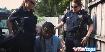 Officers make a black criminal search their mouths and pussies