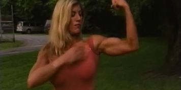 Laurie N. old scool FBB flexing in a dress