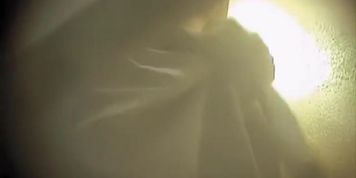 Naked bimbo in the dressing room getting clothed on