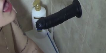 Chubby girl has fun in shower