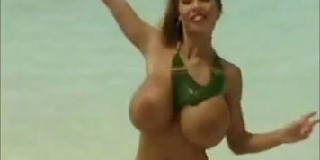 Big Tit Blonde Frolics on the Beach (Tiffany Towers)