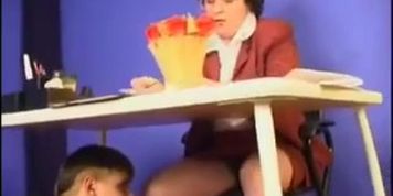 Mature teacher copulates with naughty student on desk