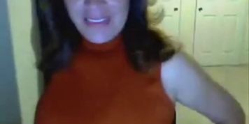 Busty MILF flashing her big bazookas