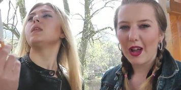 Two beautiful young babes smoking sexy